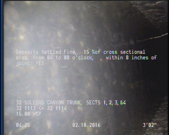 Deposits Settled Fine, 15 %of cross sectional area, from 04 to 08 o'clock, , within 8 inches of joint: YES