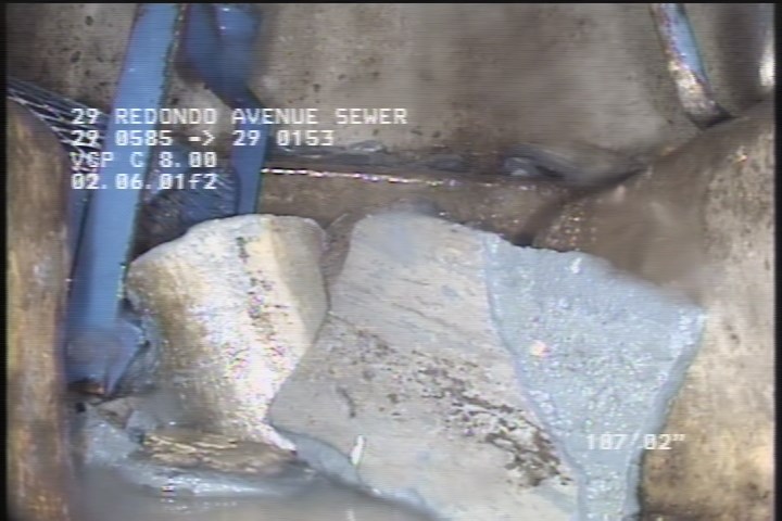 Downstream Manhole, Survey Ends - DEBRIS HAS BEEN REMOVED.