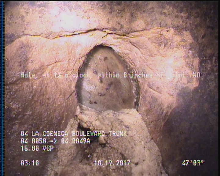 Hole, at 12 o'clock, within 8 inches of joint: NO