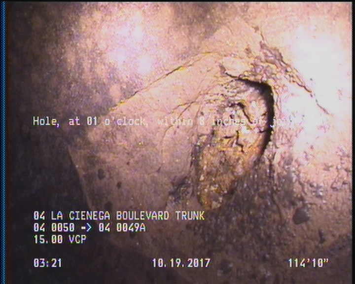 Hole, at 01 o'clock, within 8 inches of joint: NO
