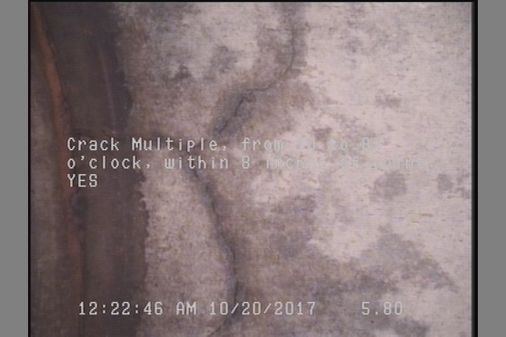 Crack Multiple, from 10 to 02 o'clock, within 8 inches of joint: YES