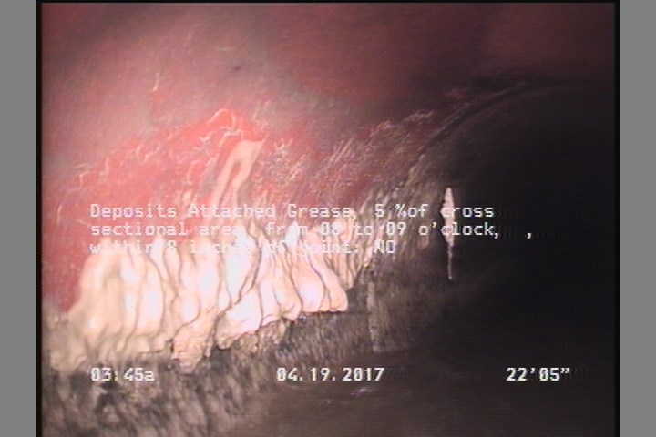 Deposits Attached Grease, 5 %of cross sectional area, from 08 to 09 o'clock, , within 8 inches of joint: NO