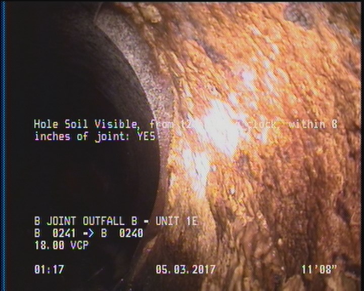 Hole, from 12 to 05 o'clock, within 8 inches of joint: YES - POSSIBLE REPAIR VISIBLE
