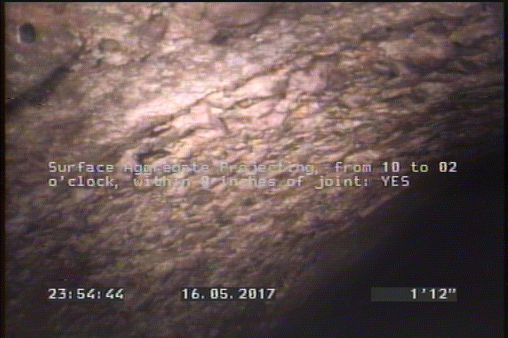 Surface Aggregate Projecting, from 10 to 02 o'clock, within 8 inches of joint: YES