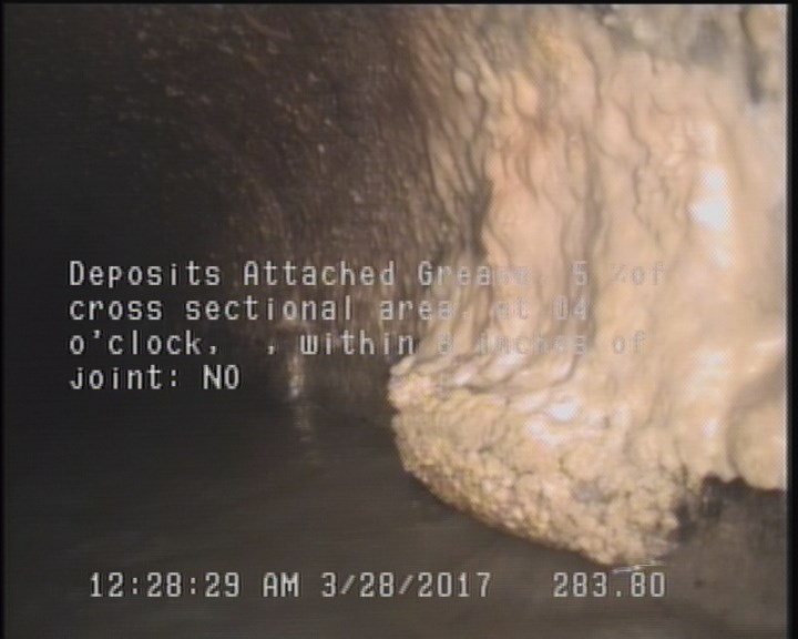 Deposits Attached Grease, 5 %of cross sectional area, at 04 o'clock, , within 8 inches of joint: NO