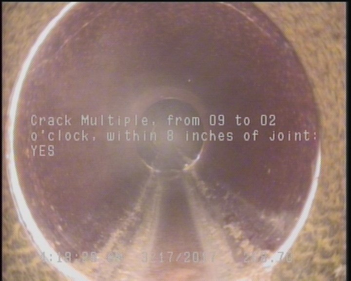 Crack Multiple, from 09 to 02 o'clock, within 8 inches of joint: YES