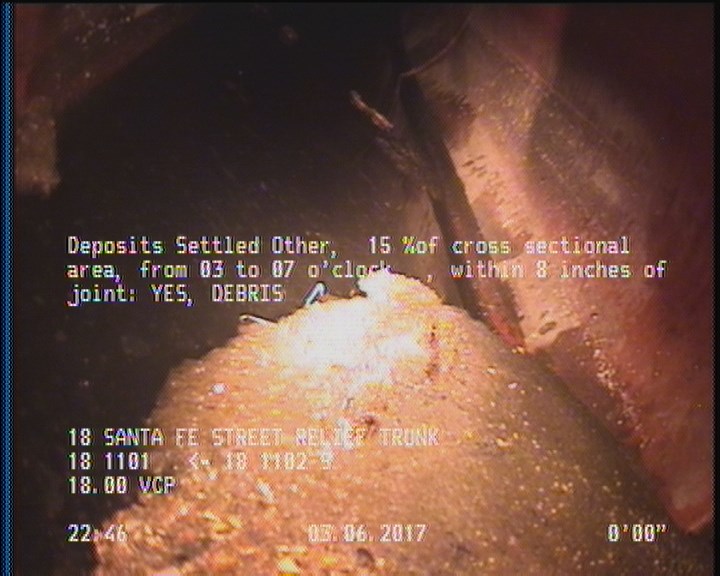 Deposits Settled Other, 15 %of cross sectional area, from 03 to 07 o'clock, , within 8 inches of joint: YES - DEBRIS