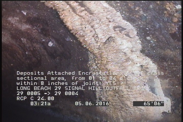 Deposits Attached Encrustation, 5 %of cross sectional area, from 01 to 04 o'clock, , within 8 inches of joint: YES