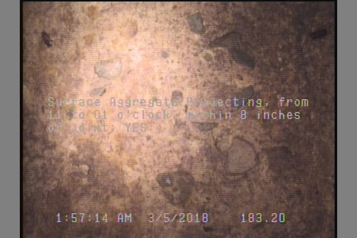 Surface Aggregate Projecting, from 11 to 01 o'clock, within 8 inches of joint: YES