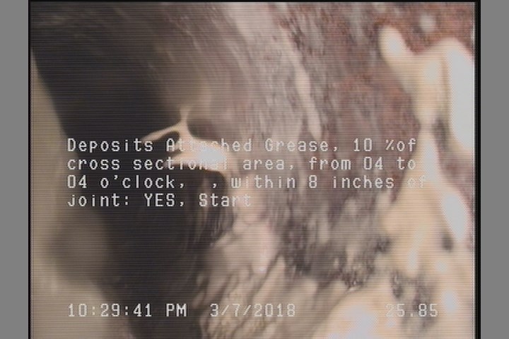 Deposits Attached Grease, 10 %of cross sectional area, from 04 to 04 o'clock, , within 8 inches of joint: YES, Start