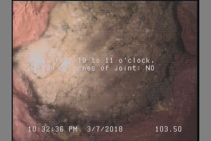 Hole, from 10 to 11 o'clock, within 8 inches of joint: YES - HOLE WITH SOIL