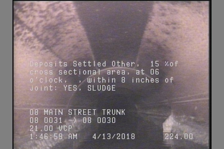 Deposits Settled Other, 15 %of cross sectional area, at 06 o'clock, , within 8 inches of joint: YES, Start - SLUDGE