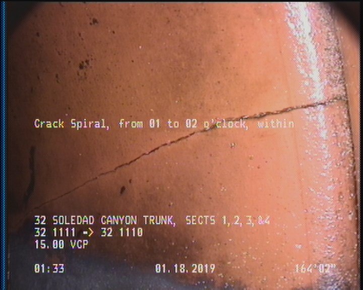 Crack Spiral, from 01 to 02 o'clock, within 8 inches of joint: YES