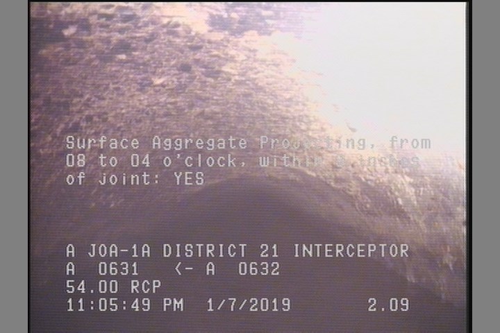 Surface Aggregate Projecting, from 08 to 04 o'clock, within 8 inches of joint: YES