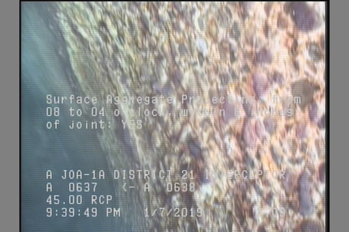 Surface Aggregate Projecting, from 08 to 04 o'clock, within 8 inches of joint: YES