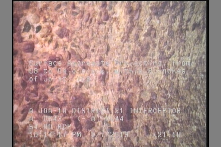 Surface Aggregate Projecting, from 08 to 04 o'clock, within 8 inches of joint: YES