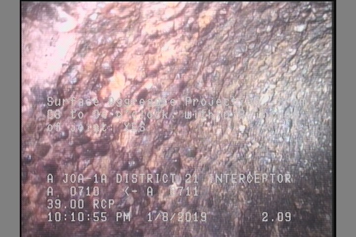 Surface Aggregate Projecting, from 08 to 04 o'clock, within 8 inches of joint: YES