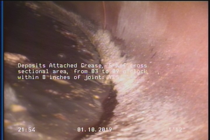 Deposits Attached Grease, 5 %of cross sectional area, from 03 to 09 o'clock, , within 8 inches of joint: YES