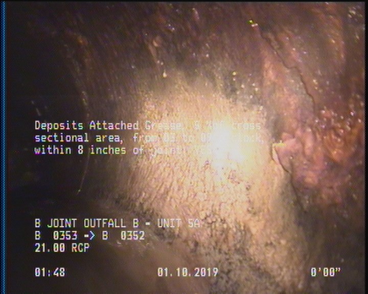 Deposits Attached Grease, 5 %of cross sectional area, from 03 to 09 o'clock, , within 8 inches of joint: YES
