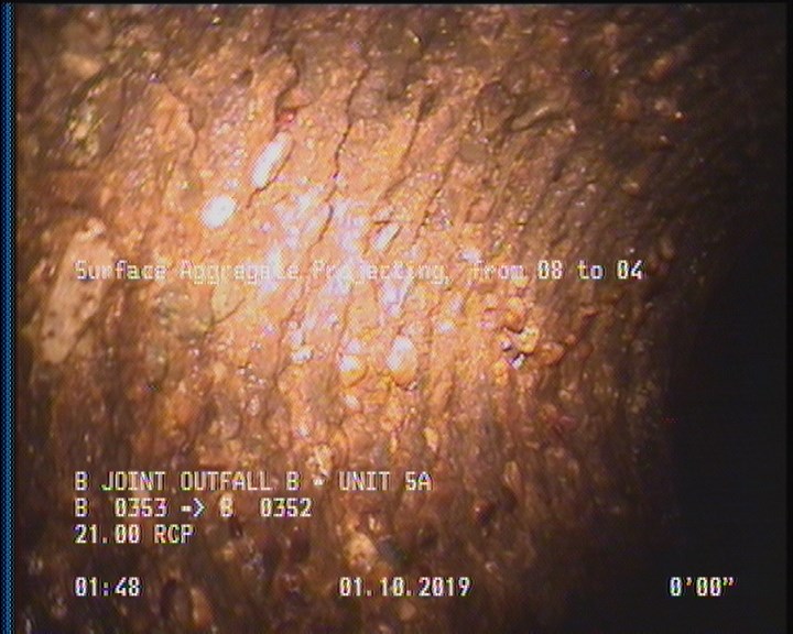 Surface Aggregate Projecting, from 08 to 04 o'clock, within 8 inches of joint: YES