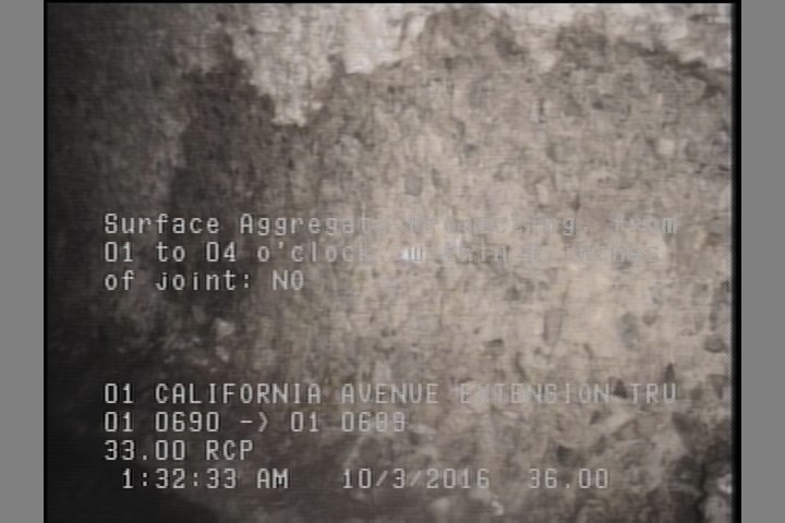 Surface Aggregate Projecting, from 01 to 04 o'clock, within 8 inches of joint: NO