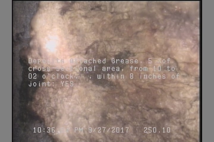 Deposits Attached Grease, 5 %of cross sectional area, from 10 to 02 o'clock, , within 8 inches of joint: YES