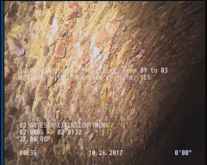 Surface Aggregate Projecting, from 09 to 03 o'clock, within 8 inches of joint: YES