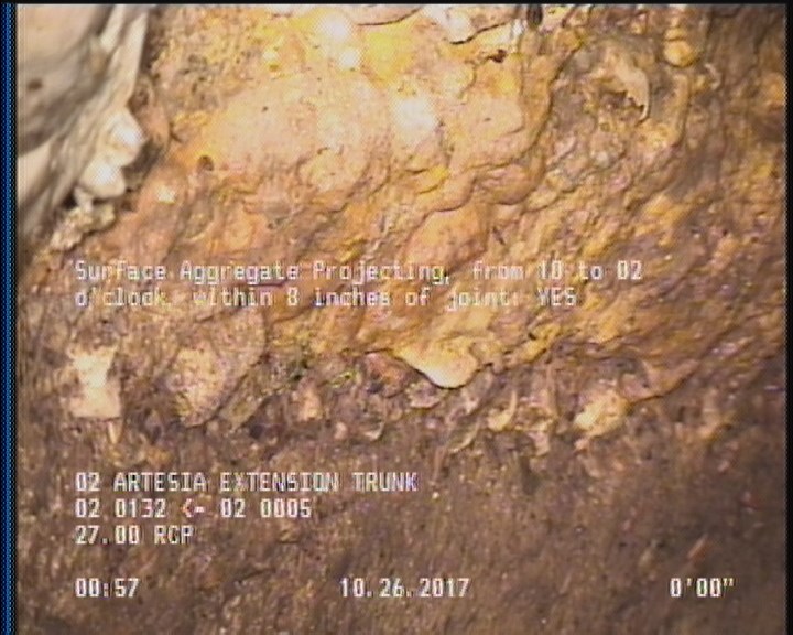 Surface Aggregate Projecting, from 10 to 02 o'clock, within 8 inches of joint: YES