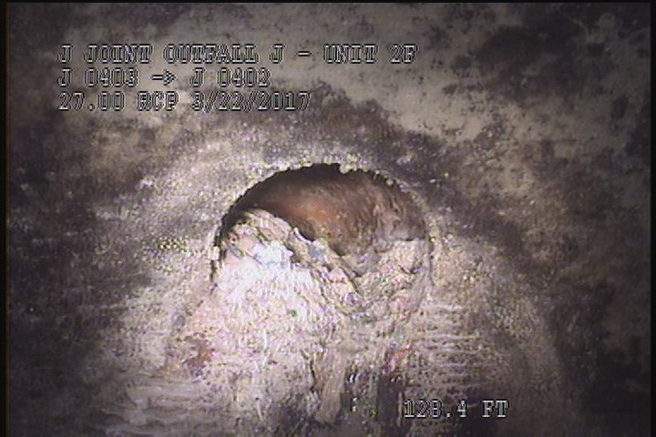 Tap Factory Made Defective, at 02 o'clock, -, within 8 inches of joint: YES, 4" - Unkown, UNSEALED, 70% BLOCKED