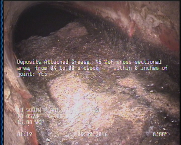 Deposits Attached Grease, 15 %of cross sectional area, from 04 to 08 o'clock, , within 8 inches of joint: YES