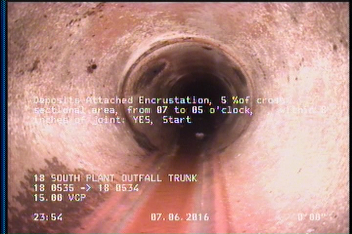 Deposits Attached Encrustation, 5 %of cross sectional area, from 07 to 05 o'clock, , within 8 inches of joint: YES, Start