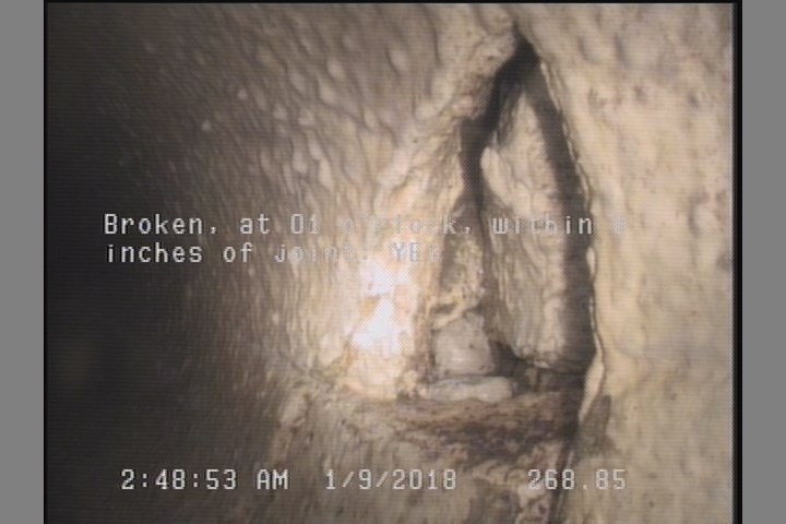 Broken, at 01 o'clock, within 8 inches of joint: YES