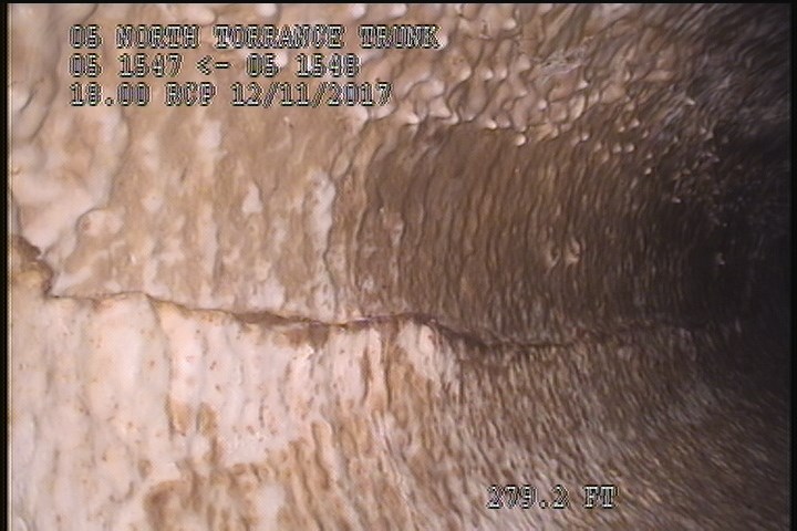 Surface Spalling, from 08 to 04 o'clock, within 8 inches of joint: NO - PEELING CONCRETE UNDER MAG COAT