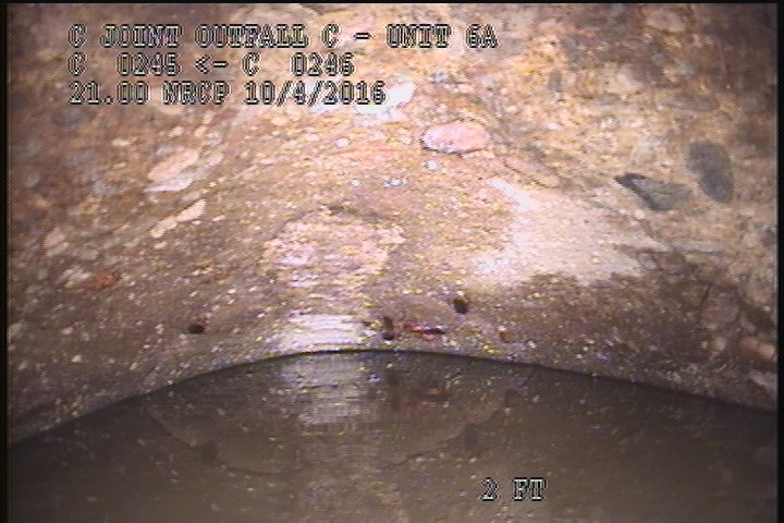 Downstream Manhole, Survey Begins - 9:12 AM