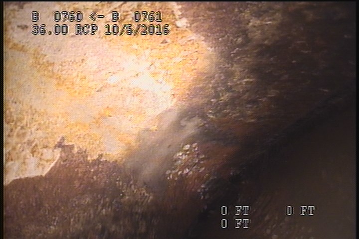 Surface Spalling, from 10 to 02 o'clock, within 8 inches of joint: YES - BLISTERING PEELING CONCRETE