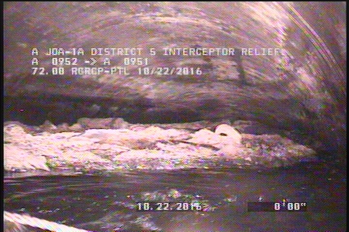 Deposits Attached Ragging, 30 %of cross sectional area, from 10 to 02 o'clock, , within 8 inches of joint: YES - THICK DEBRIE IN SIPHON