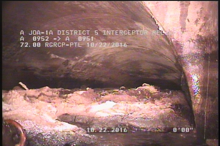 Deposits Attached Ragging, 30 %of cross sectional area, from 10 to 02 o'clock, , within 8 inches of joint: YES - DEBRIE IN SIPHON