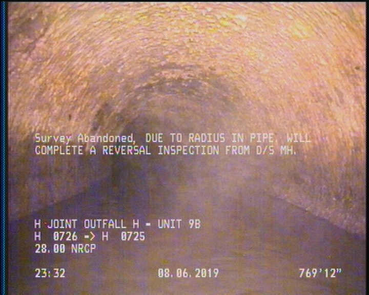 Survey Abandoned - DUE TO RADIUS IN PIPE. WILL COMPLETE A REVERSAL INSPECTION FROM D/S MH.