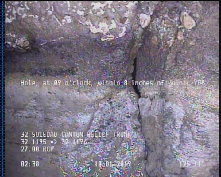 Hole, at 09 o'clock, within 8 inches of joint: YES