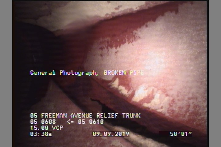 General Photograph - BROKEN PIPE W/ VOID AND SOIL VISIBLE