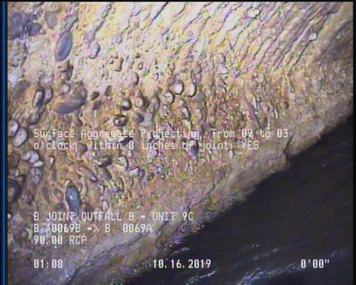 Surface Aggregate Projecting, from 09 to 03 o'clock, within 8 inches of joint: YES