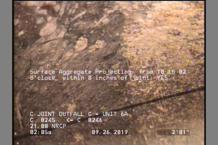 Surface Aggregate Projecting, from 10 to 02 o'clock, within 8 inches of joint: YES