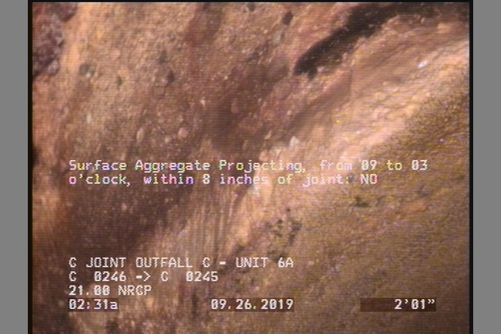Surface Aggregate Projecting, from 09 to 03 o'clock, within 8 inches of joint: NO