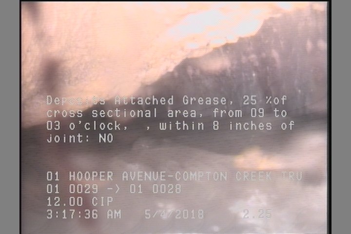 Deposits Attached Grease, 25 %of cross sectional area, from 09 to 03 o'clock, , within 8 inches of joint: NO