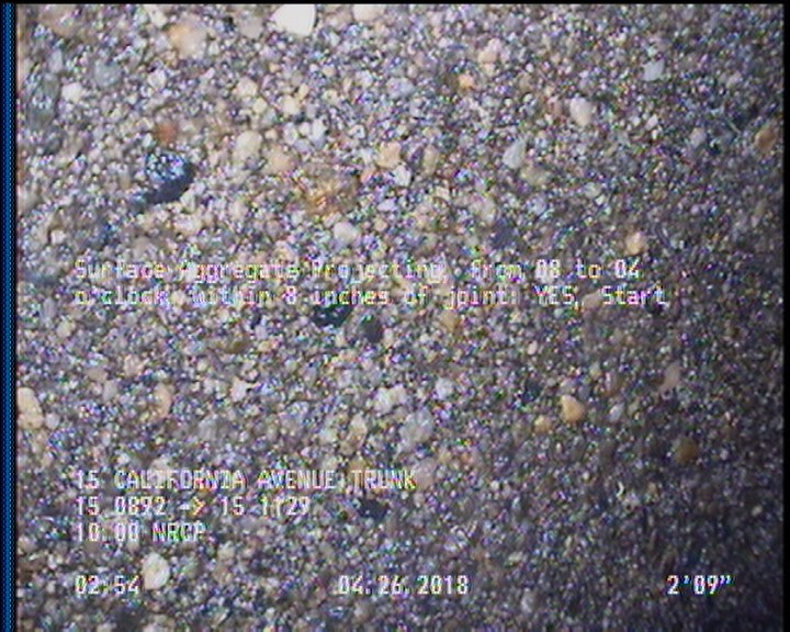 Surface Aggregate Projecting, from 08 to 04 o'clock, within 8 inches of joint: YES, Start