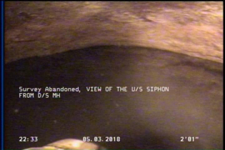 Survey Abandoned - VIEW OF THE U/S SIPHON FROM D/S MH