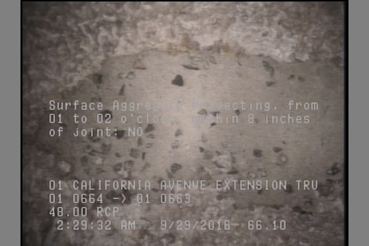 Surface Aggregate Projecting, from 01 to 02 o'clock, within 8 inches of joint: NO