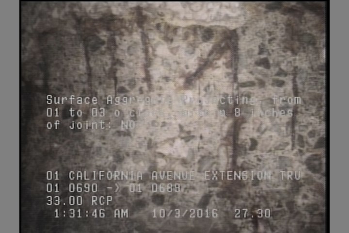 Surface Aggregate Projecting, from 01 to 03 o'clock, within 8 inches of joint: NO