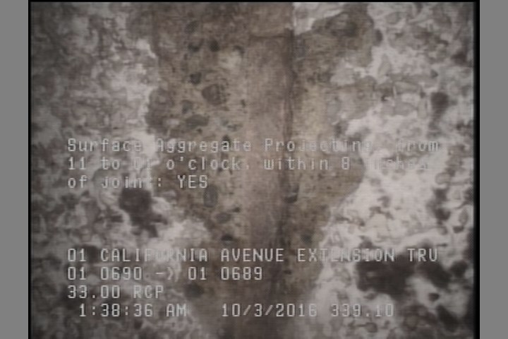 Surface Aggregate Projecting, from 11 to 01 o'clock, within 8 inches of joint: YES