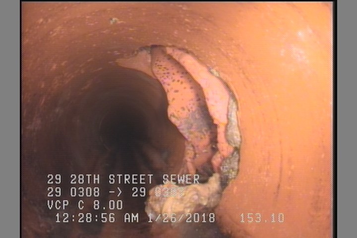 Tap Break-In Intruding, at 03 o'clock, soil visible, -, within 8 inches of joint: NO, 6", 1"